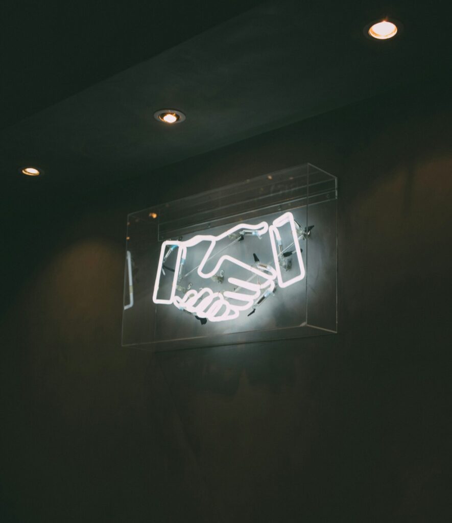 Human hand neon signage